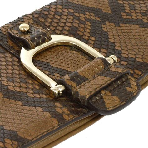 gucci signature clutch|Gucci snakeskin clutch.